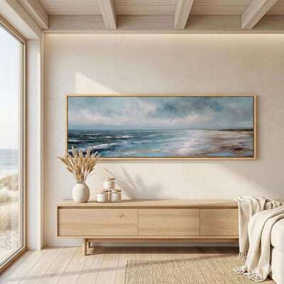 Coastal farmhouse living room with exposed timber beams, woven baskets, and natural fabrics.