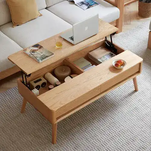 Modern wood coffee table with lower shelf styled with books and decor